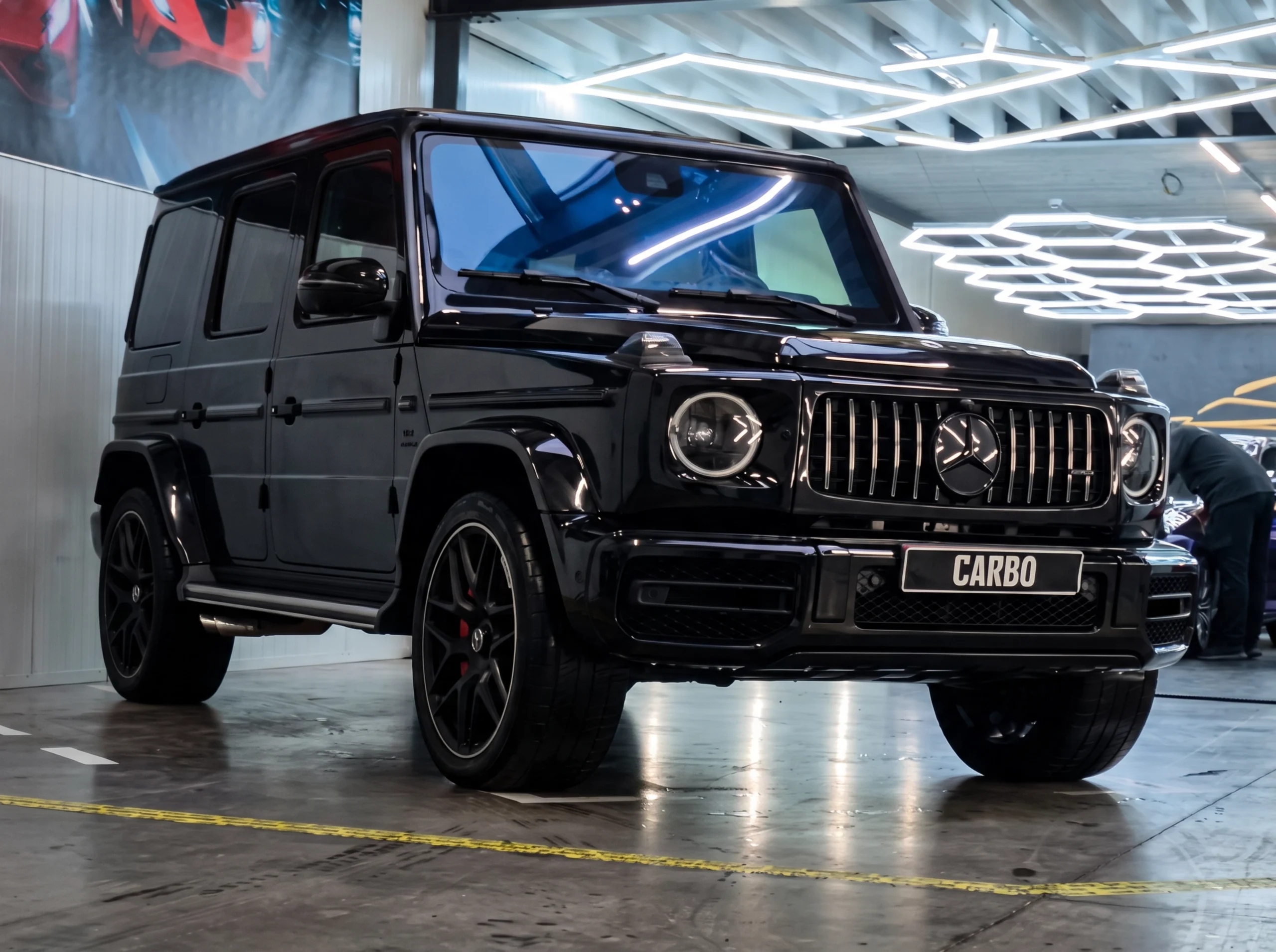 Carbo-Portofilo 5 Zwarte Mercedes-AMG G 63 voorzien van Paint Protection Film (PPF) transparante lakbescherming in de studio