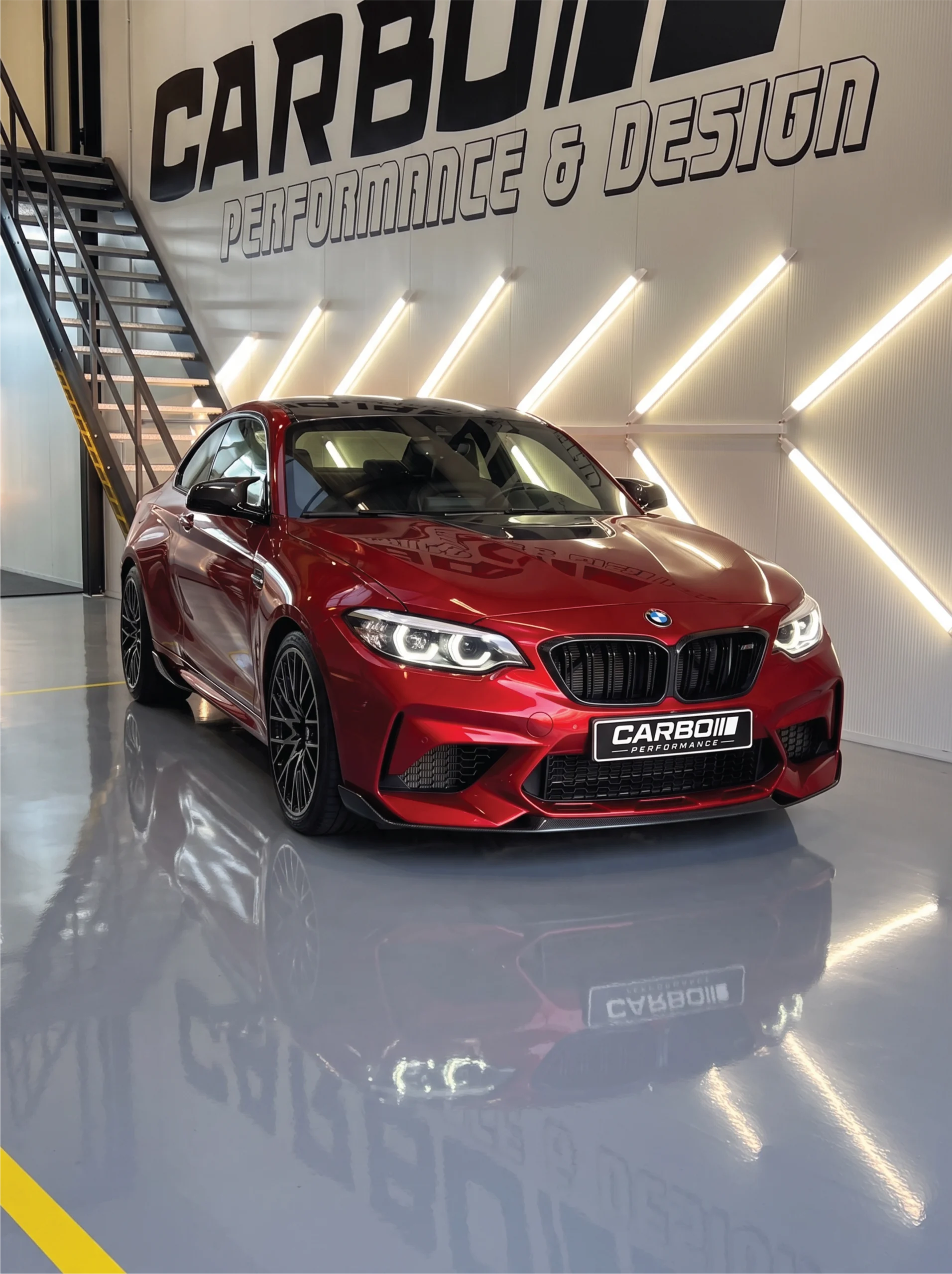 Rode BMW M2 Competition F87 met Front-End Paint Protection Film (PPF) lakbescherming in de studio